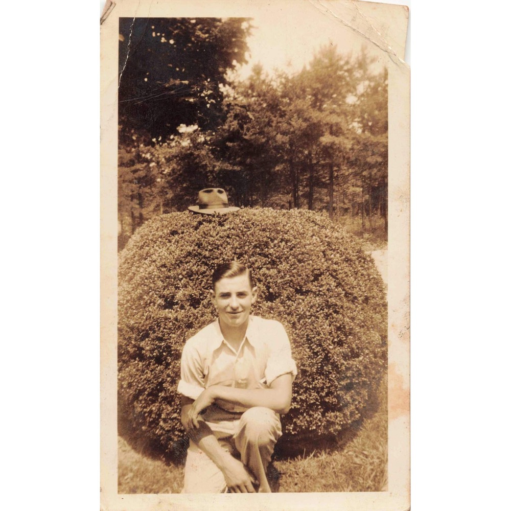 1940s Vintage Photograph Young Man Posed Outdoors Hat Bush Funny Portrait - Picture 1 of 3